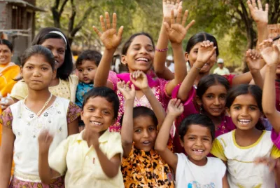 Women gathered in a farming community discussion